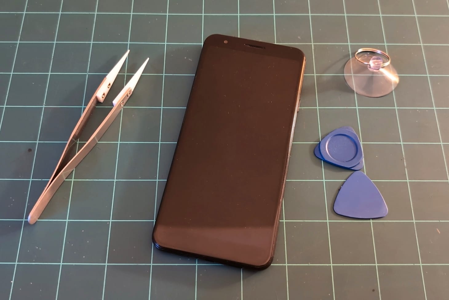 Phone on workbench ready for disassembly