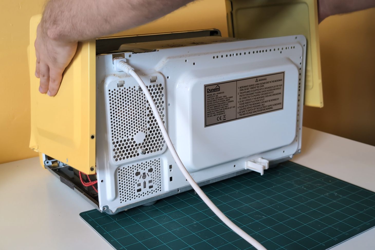 Removing the outer cover.