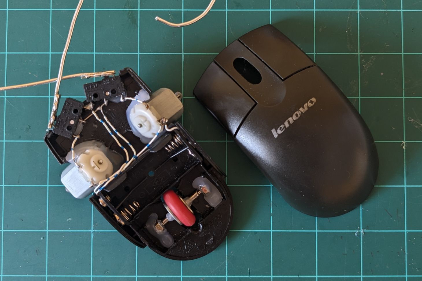 A computer mouse turned into an obstacle avoiding robot.